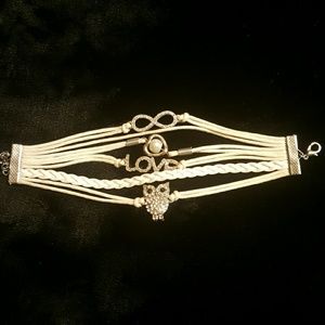 Multi charm rhinestone corded cuff bracelet